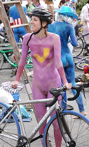 Paint-smeared nudists arrived at the festival on bicycles